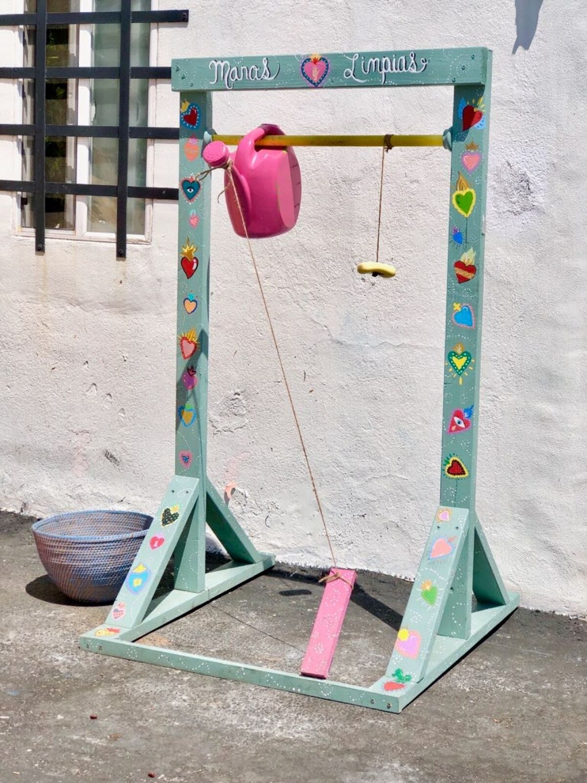 One of Alexandra Perez Demma's hand washing stations placed along Logan Avenue during Walk The Block