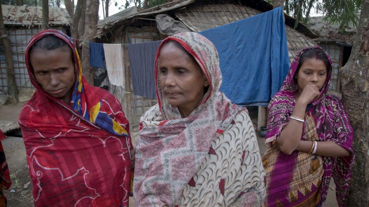 Jushna Pal, center, and her neighbors in the Hindu Camp in southern Bangladesh.
