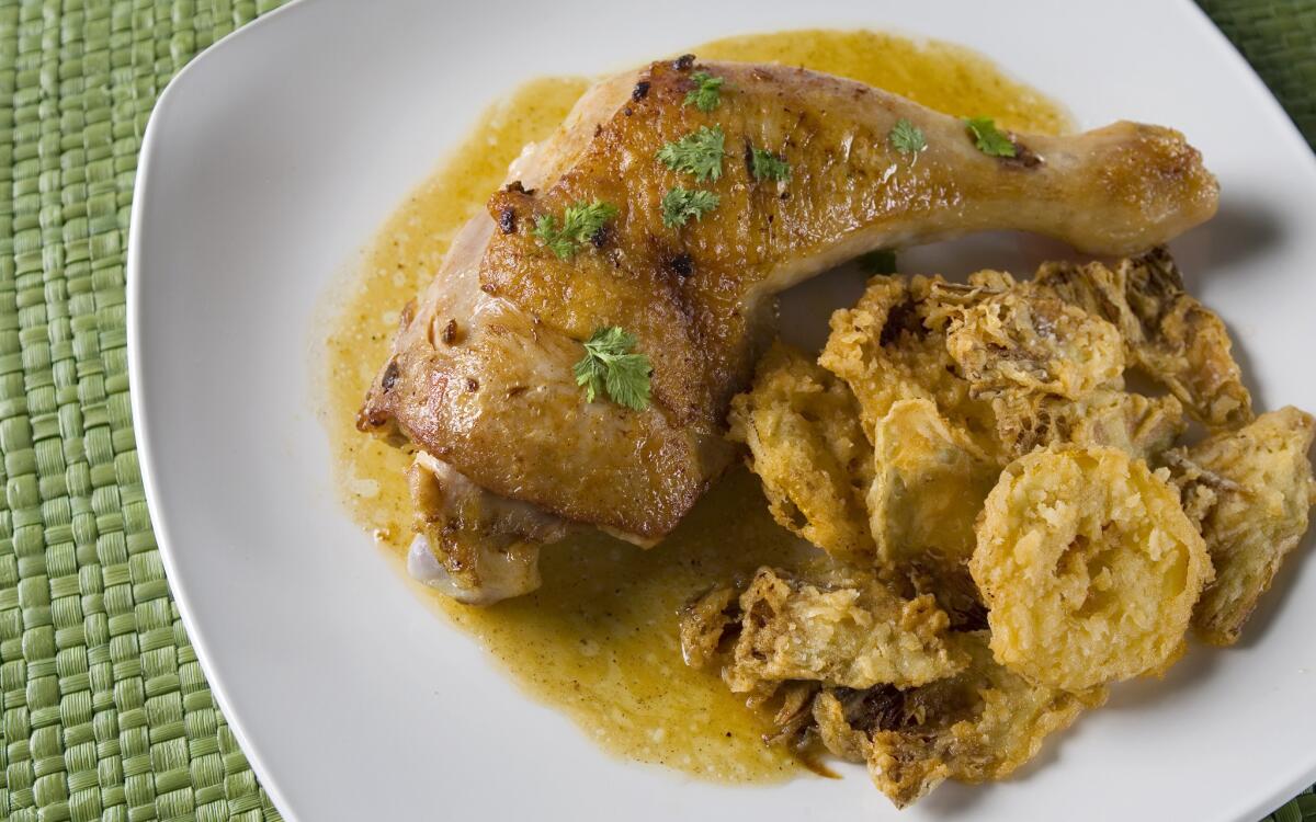 Roast chicken with fried artichokes and lemons