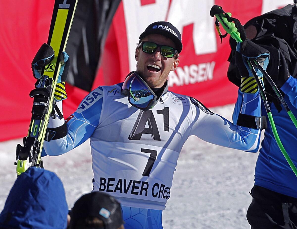 Ted Ligety celebrates his victory in the men's giant slalom on Sunday.