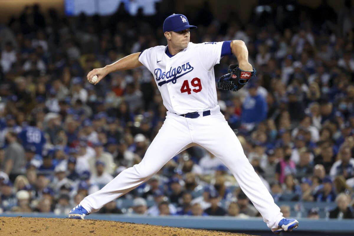 Dodgers relief pitcher Blake Treinen delivers during the sixth inning.