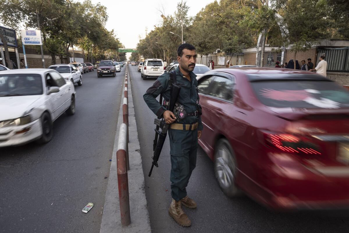 Kabul police secure the roads with police checkpoints on August 13, 2021 in Kabul, Afghanistan. 