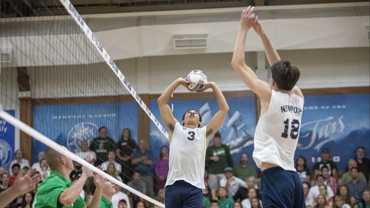 Newport Harbor High's Joe Karlous sets for Ethan Talley during the semifinals of the CIF Southern Section Division 1 playoffs against South Torrance on Wednesday.