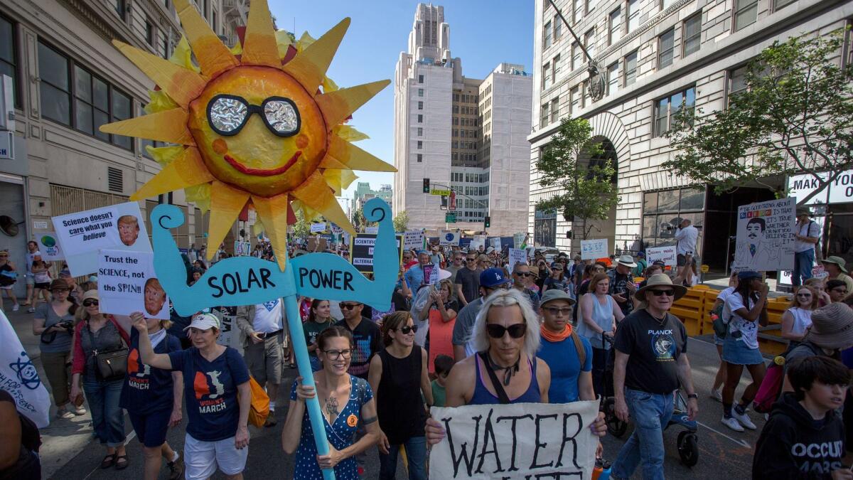 California's large number of environmental advocates, like these participants in the 2017 March for Science in Los Angeles, are one factor that has made recruiting a regional environment chief for the Trump administration a tough sell.