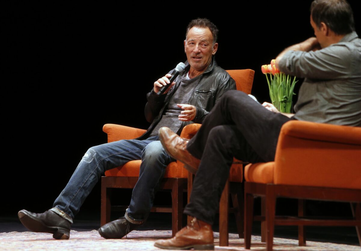 Musician Bruce Springsteen talks about his book "Born to Run" with Dan Stone last week at the Nourse Theater in San Francisco.