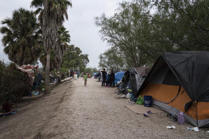 An encampment where asylum seekers live near the Gateway International Bridge as seen on Friday, Nov. 22, 2019 in Matamoros, Mexico. Verónica G. Cárdenas / For The Times
