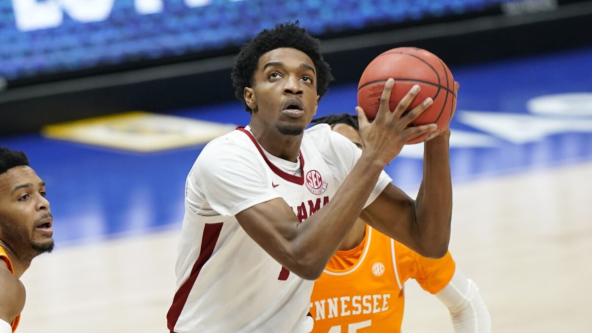 Alabama's Herbert Jones looks to shoot against Tennessee during the Southeastern Conference tournament on Saturday.