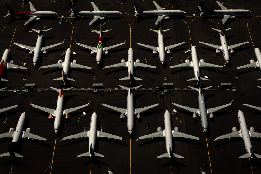 Boeing 737 Max planes sit, grounded