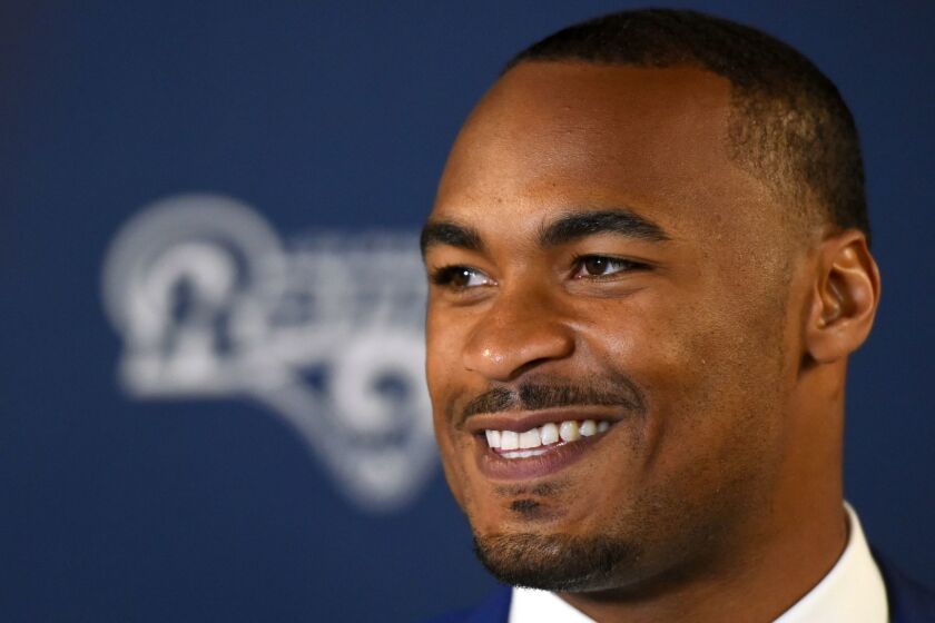 Los Angeles Rams newly signed free agent wide receiver Robert Woods smiles during a news conference at the NFL Rams' training facility in Thousand Oaks, Calif., Friday, March 10, 2017. (AP Photo/Michael Owen Baker)