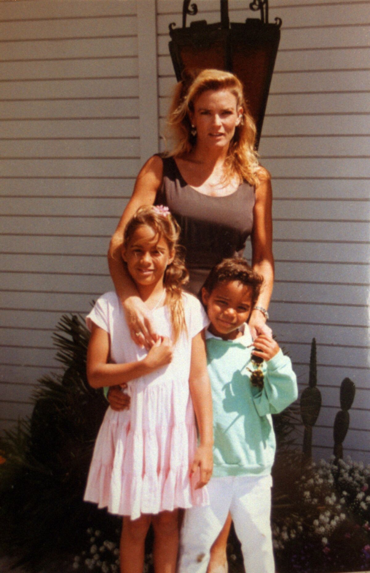 Nicole Brown Simpson with daughter Sydney and son Justin outside her parents' home. (For The Times)