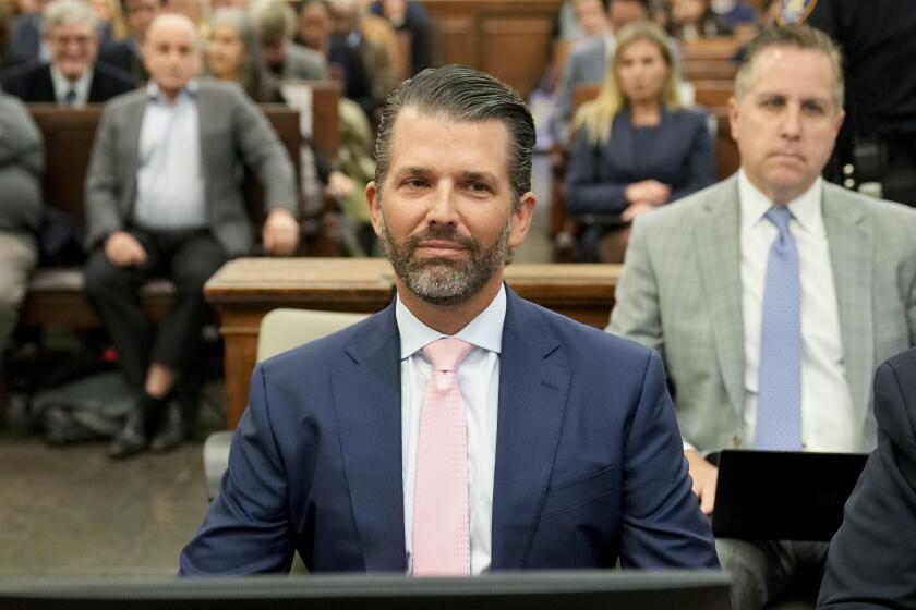 Donald Trump Jr. waits to testify in New York Supreme Court, Wednesday, Nov. 1, 2023, in New York. Donald Trump's eldest sons are set to testify in the New York civil fraud case that threatens their company's future, but a demand for daughter Ivanka's testimony is being challenged. (AP Photo/Seth Wenig)