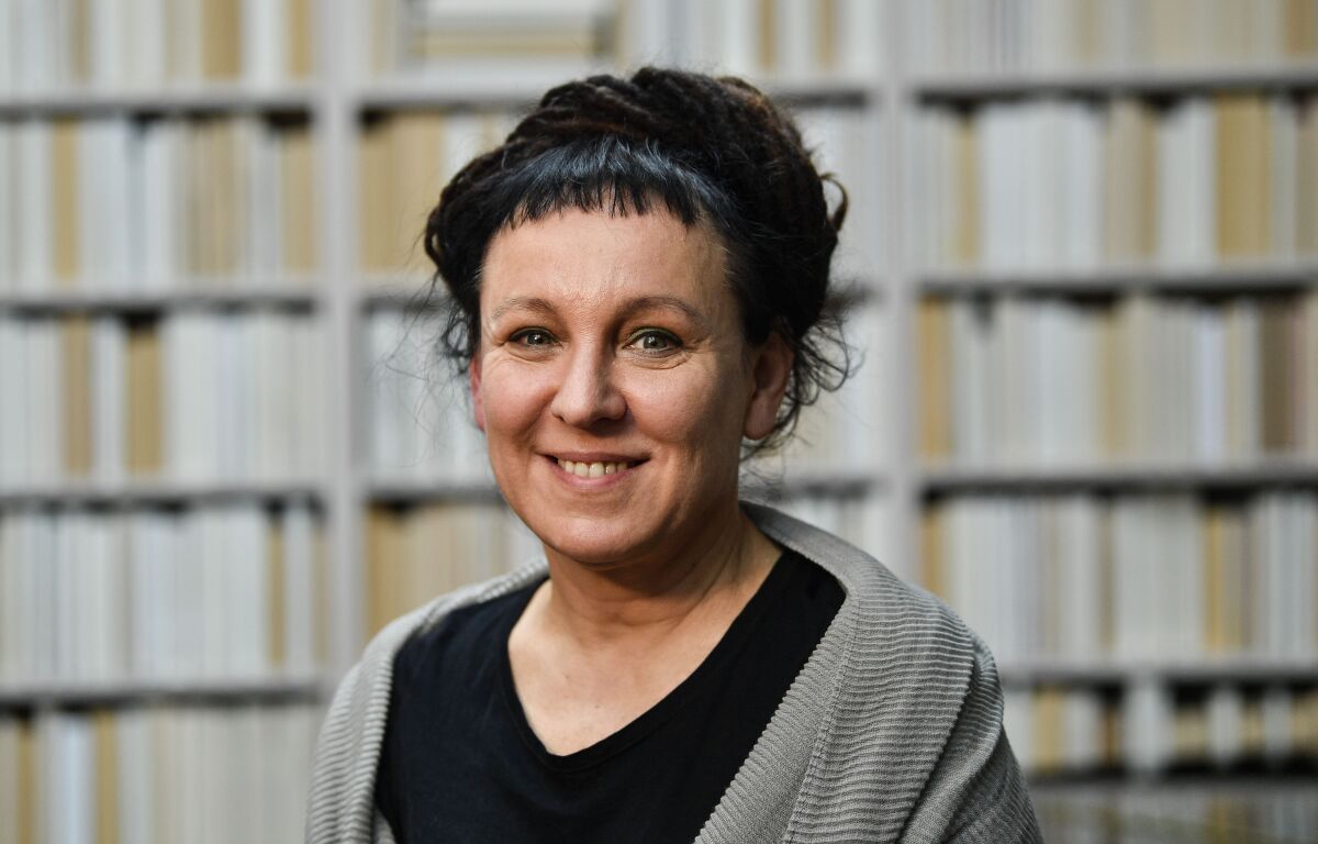 FILE - Polish writer and Nobel Prize winner Olga Tokarczuk poses for a portrait after a press conference in Duesseldorf, Germany, Oct. 11, 2019. Polish Nobel literature laureate Olga Tokarczuk and Israeli novelist David Grossman are both in the running for a second time for the International Booker Prize for fiction in English translation it was announced Thursday March 10, 2022. (AP Photo/Martin Meissner, File)