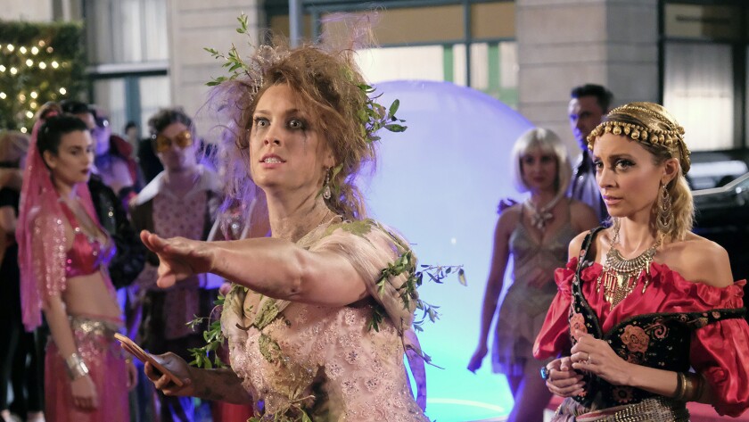 Katie and Portia (Briga Heelan, left, and Nicole Richie) attend a fancy Halloween party in a new episode of "Great News" on NBC.