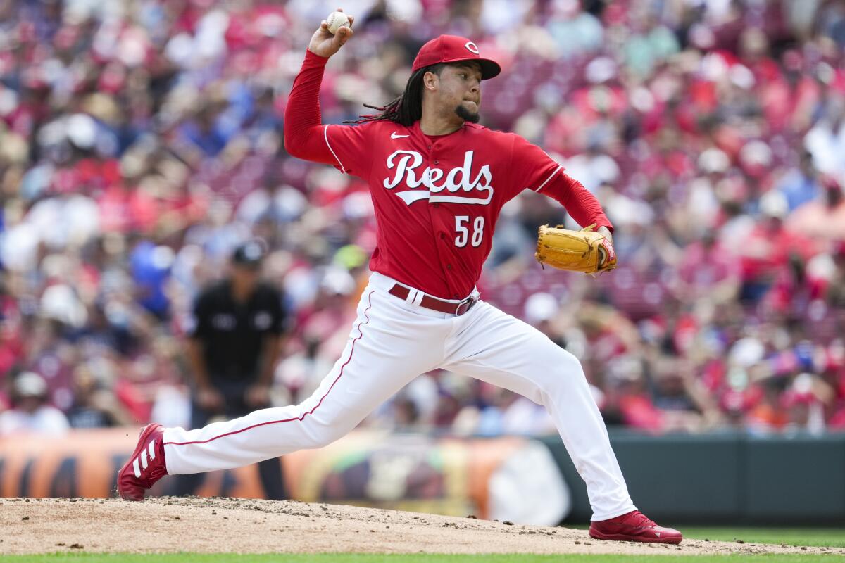 Cincinnati Reds starting pitcher Luis Castillo throws during the third inning of a baseball game against the Atlanta Braves, Sunday, July 3, 2022, in Cincinnati. (AP Photo/Jeff Dean)