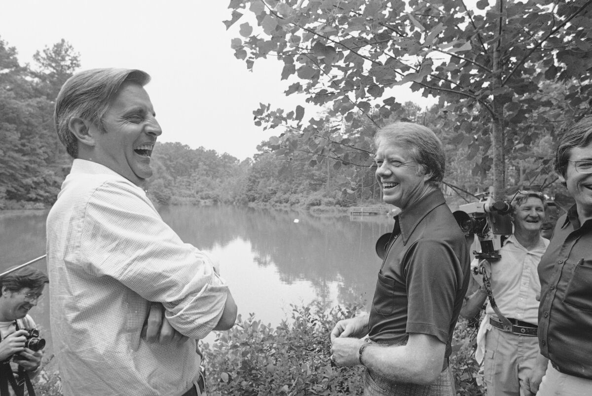 Democratic presidential nominee Jimmy Carter and his running mate, Walter Mondale, share a joke