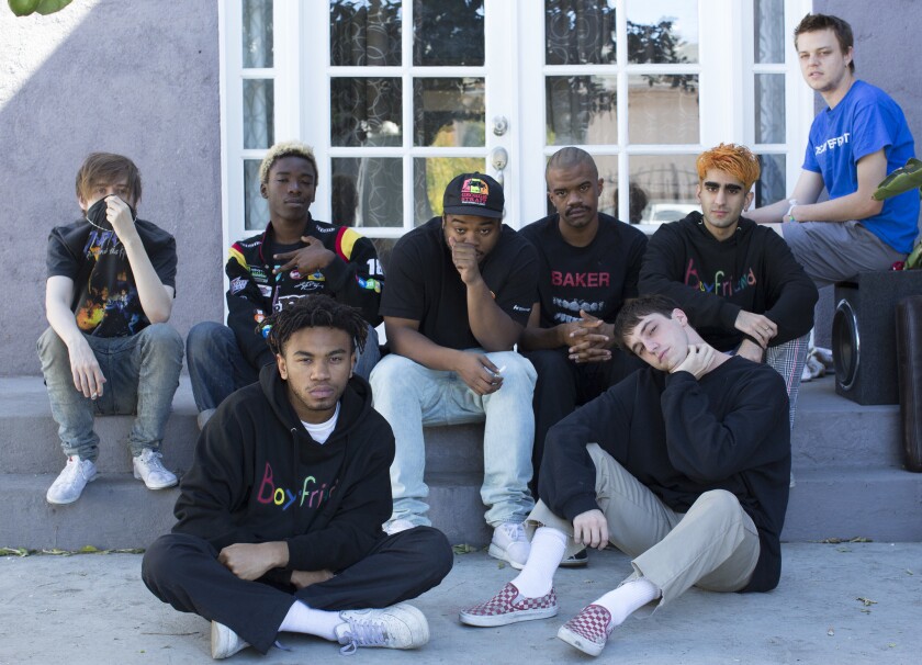 Brockhampton outside its North Hollywood home. Some of the members, from left to right in the front: Kevin Abstract, Matt Champion. Rear left to right: Bearface, Merlyn Wood, Dom McLennon, Ameer Vann, Romil Hemnani and JOBA.