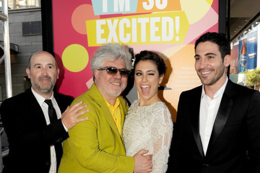 Actor Javier Camara, left, director Pedro Almodovar, actors Blanca Suarez and Miguel Angel Silvestre arrive at the North American premiere of "I'm So Excited!" during the 2013 Los Angeles Film Festival.