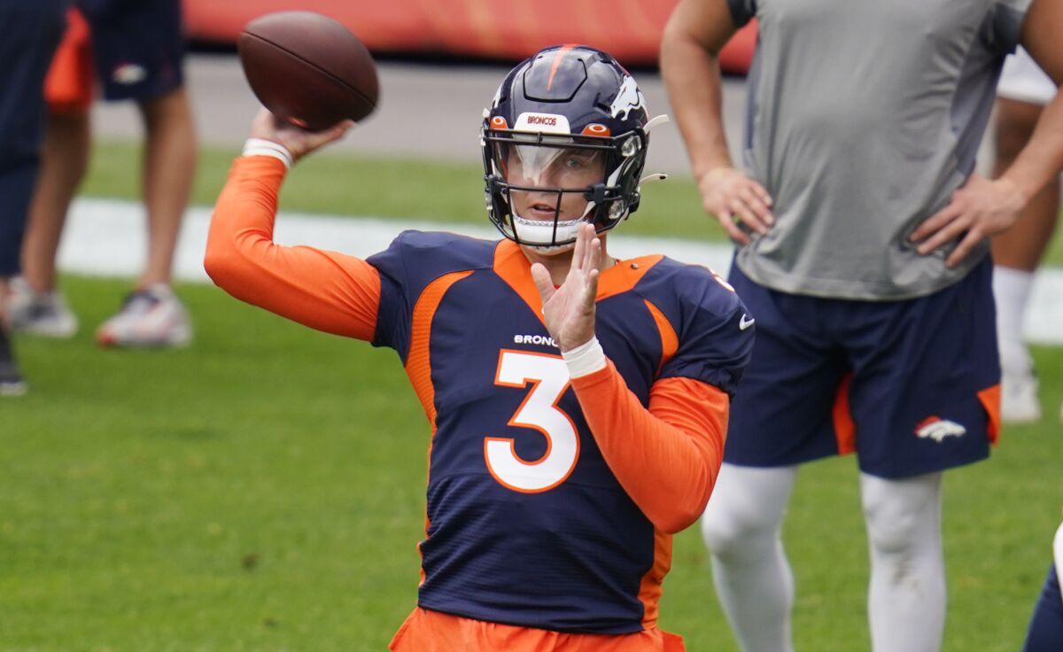 Denver Broncos quarterback Drew Lock passes in practice.
