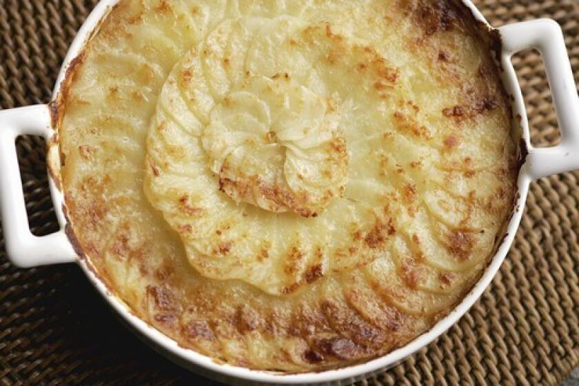 DELICIOUS: Layers of potatoes and wild mushrooms, all bathed in cream, are slowly baked in Daniel Boulud's gratin.