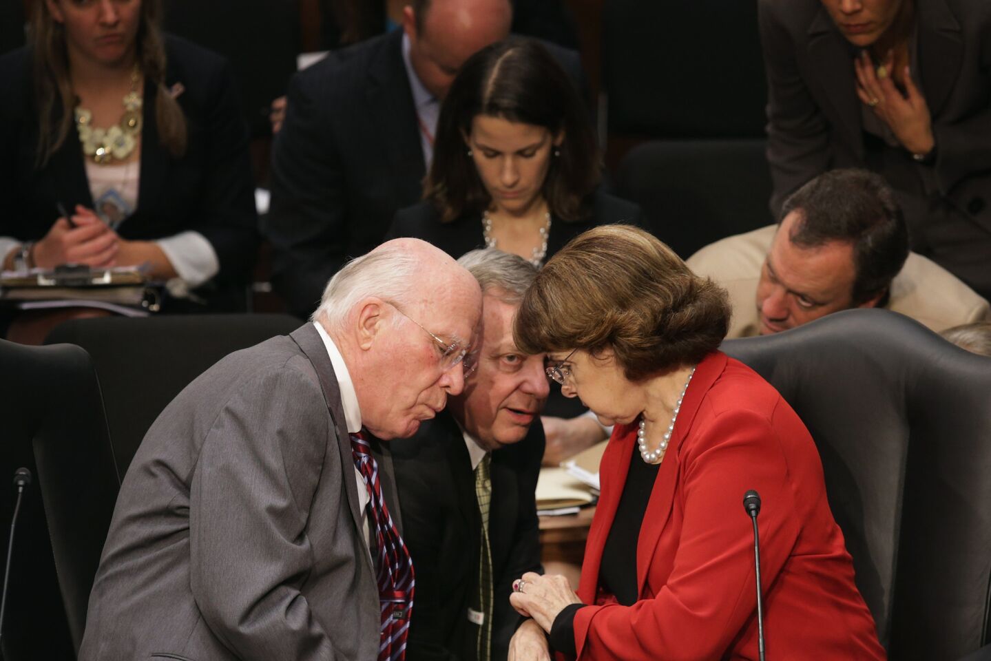 Senate Judiciary Committee Chairman Patrick Leahy (D-Vt.), from left, Sen. Richard Durbin (D-Ill.) and Sen. Dianne Feinstein (D-Calif.) discuss negotiations with Republicans during a markup session for the immigration reform legislation on Capitol Hill.