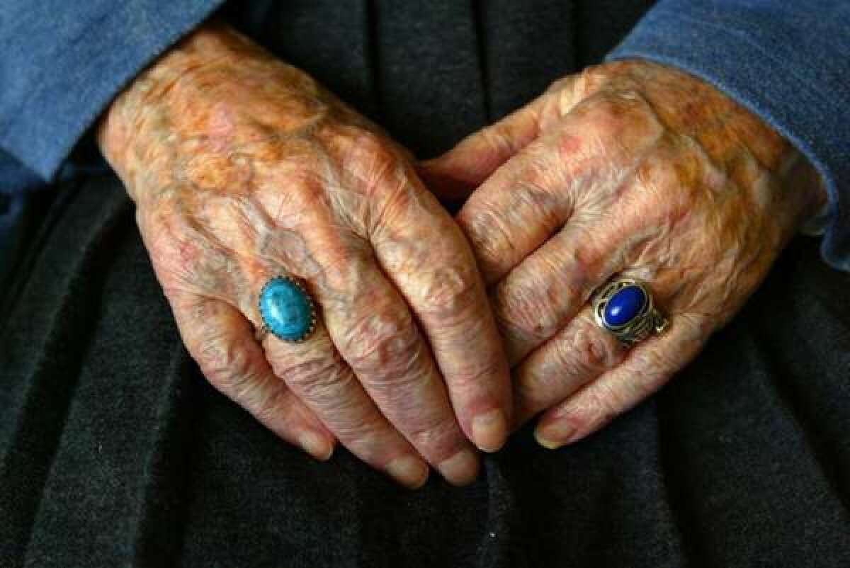 The hands of Marion Higgins of Seal Beach, who was the oldest person in California when she died in 2006, at 112. Researchers in the journal Cell published a list of the nine hallmarks of aging on the cellular level.