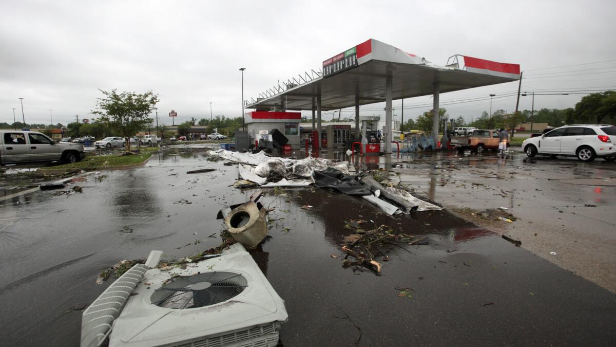 Businesses and vehicles were damaged in Vicksburg, Miss., after a possible tornado.