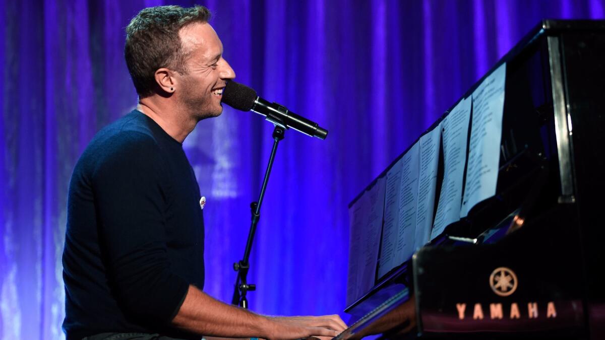 Coldplay's Chris Martin performs songs by George Michael, Leonard Cohen, Prince and David Bowie during An Unforgettable Evening.