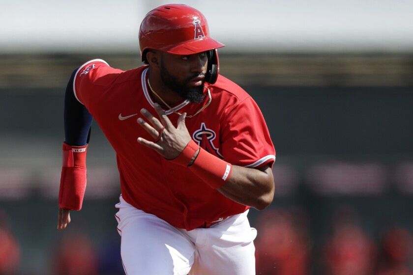 Los Angeles Angels' outfielder Jo Adell leads off from second base during a spring training baseball game.