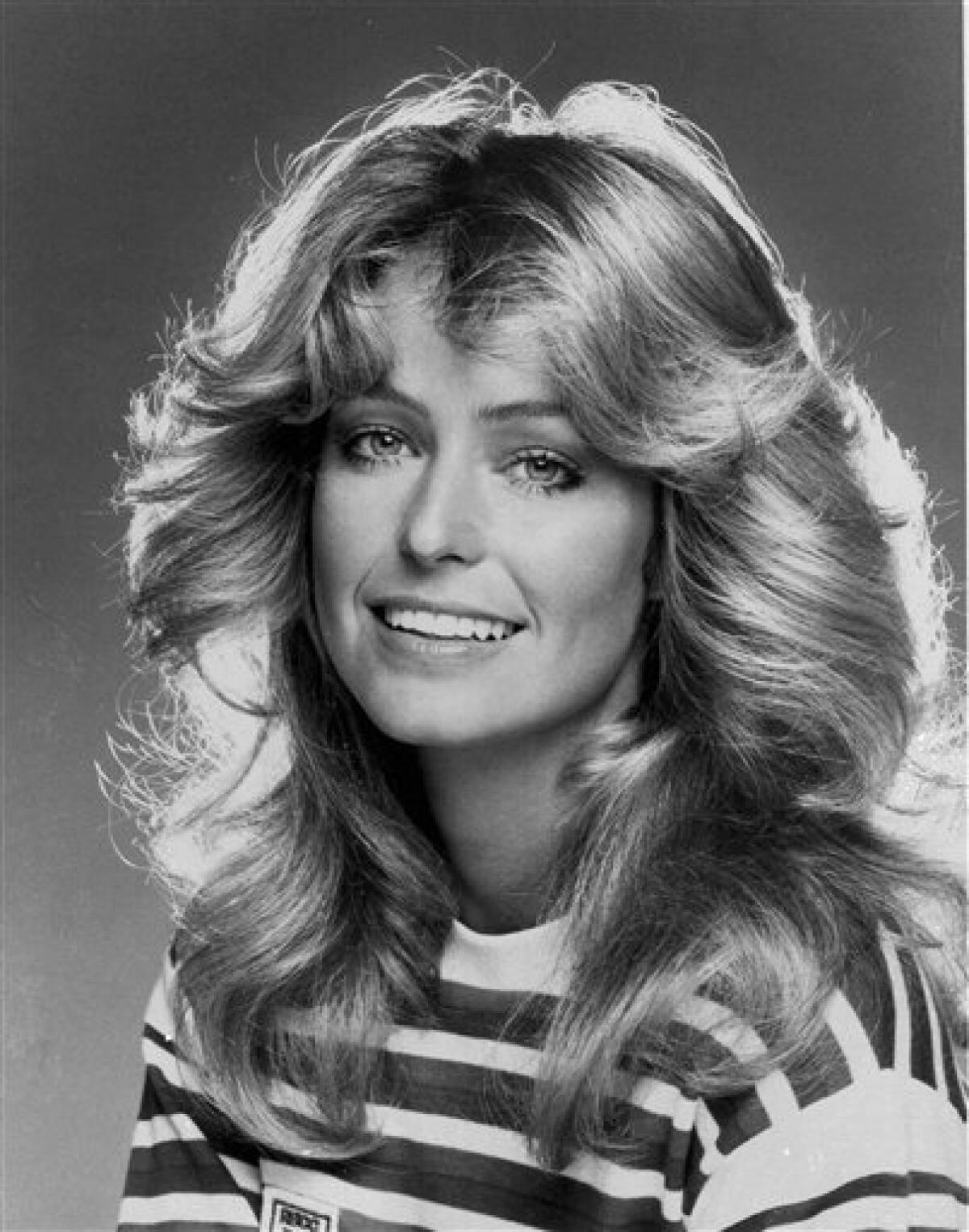 FILE - In this Jan. 1977 file photo originally released by ABC, actress Farrah Fawcett-Majors from "Charlie's Angels" is shown. Fawcett died Thursday, June 25, 2009, at a hospital in Los Angeles. She was 62. (AP Photo/ABC, file)