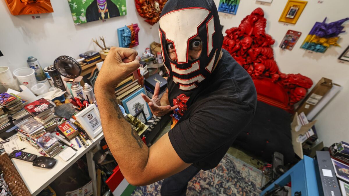 Behind the Masks: Optimus Volts channels a love of classic cartoons, sports activities and Mexican tradition into his artwork