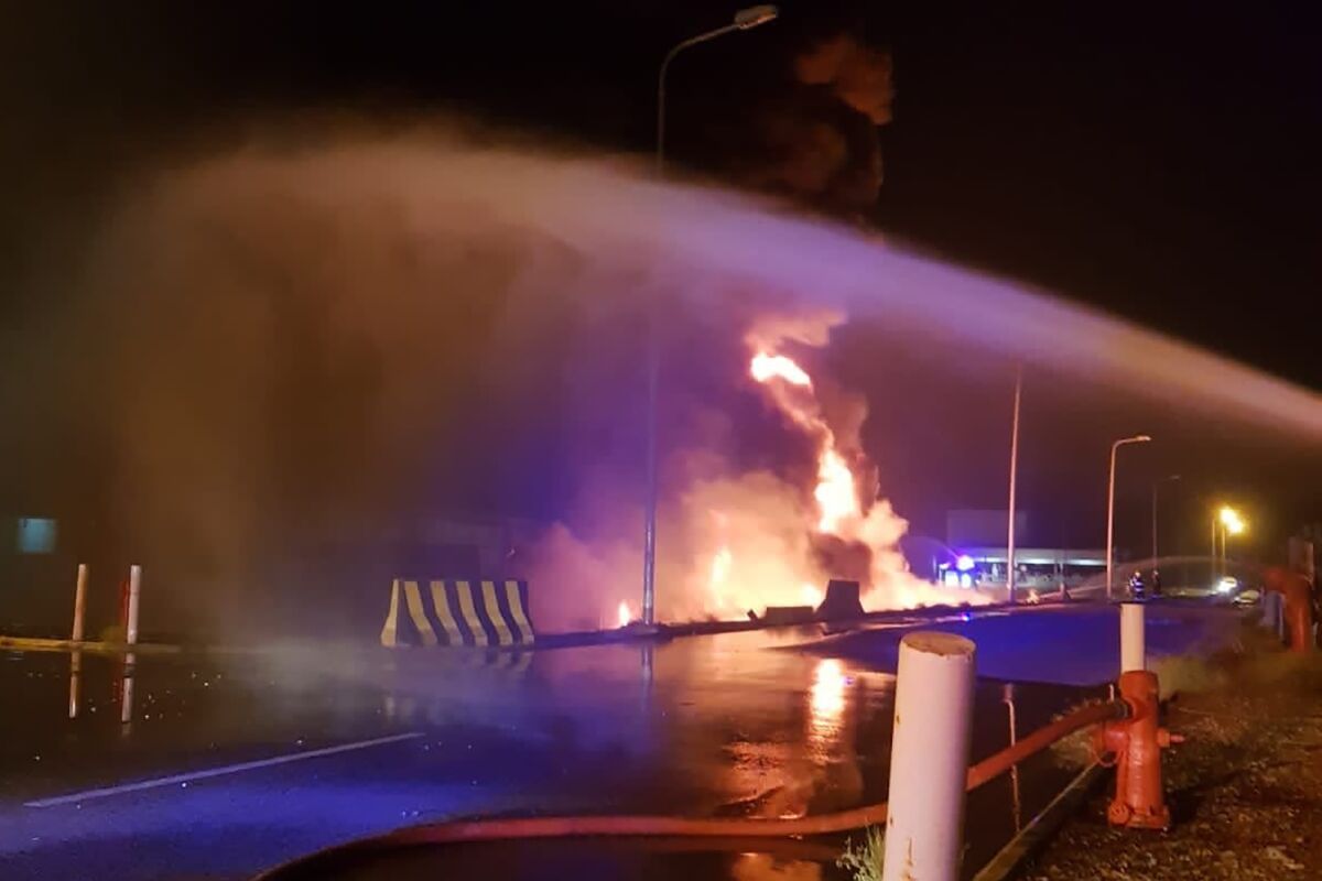 Saudi firefighters battle a blaze at an oil facility.