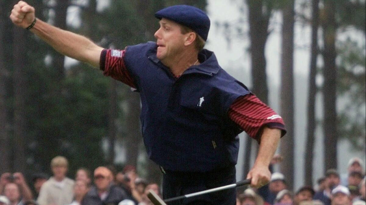 Payne Stewart celebrates after winning the U.S. Open golf championship at the Pinehurst No. 2 course in Pinehurst, N.C. on June 20, 1999.