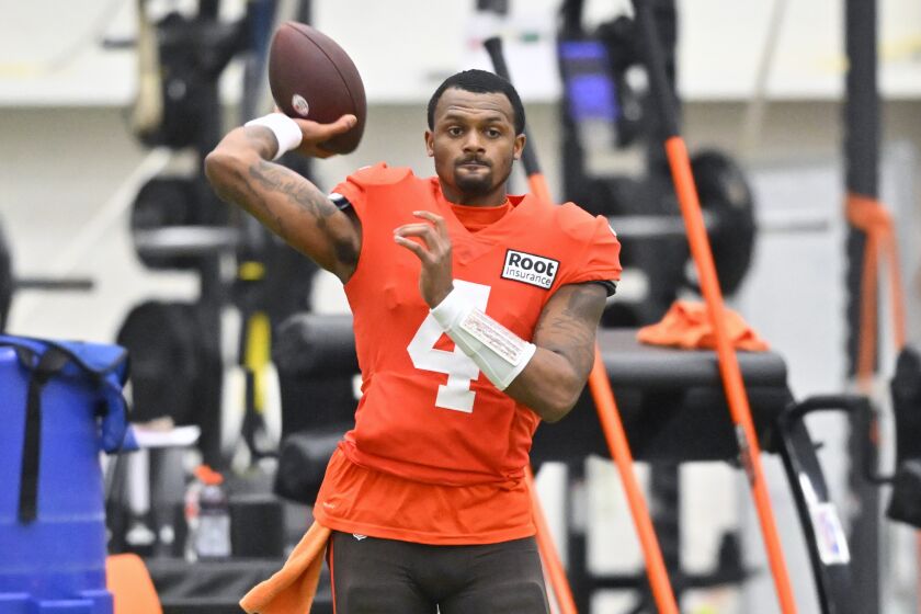 Cleveland Browns quarterback Deshaun Watson throws a pass during an NFL football practice at the team's training facility Wednesday, Nov. 30, 2022, in Berea, Ohio. (AP Photo/David Richard)