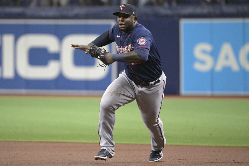 Minnesota Twins first baseman Miguel Sano sprints to the bag to get an out after fielding a ground ball by Tampa Bay Rays' Brandon Lowe during the first inning of a baseball game, Saturday, April 30, 2022, in St. Petersburg, Fla. (AP Photo/Phelan M. Ebenhack)