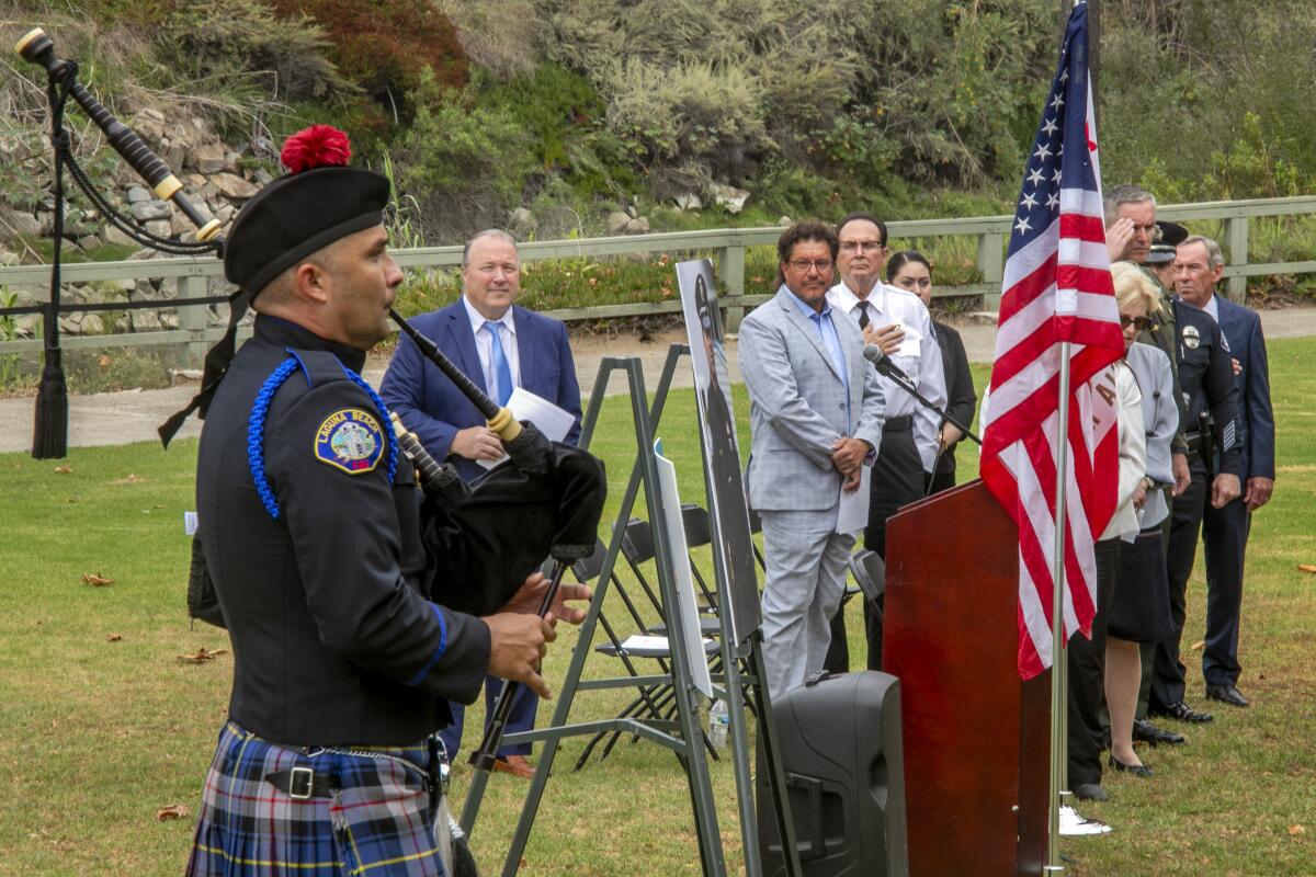 Laguna Beach Police Color Guard bagpiper David Lopez plays at the conclusion of the ceremony.