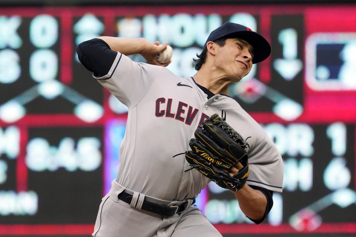 Cleveland Indians pitcher Eli Morgan throws against the Minnesota Twins in the first inning of a baseball game, Tuesday, Aug. 17, 2021, in Minneapolis. (AP Photo/Jim Mone)