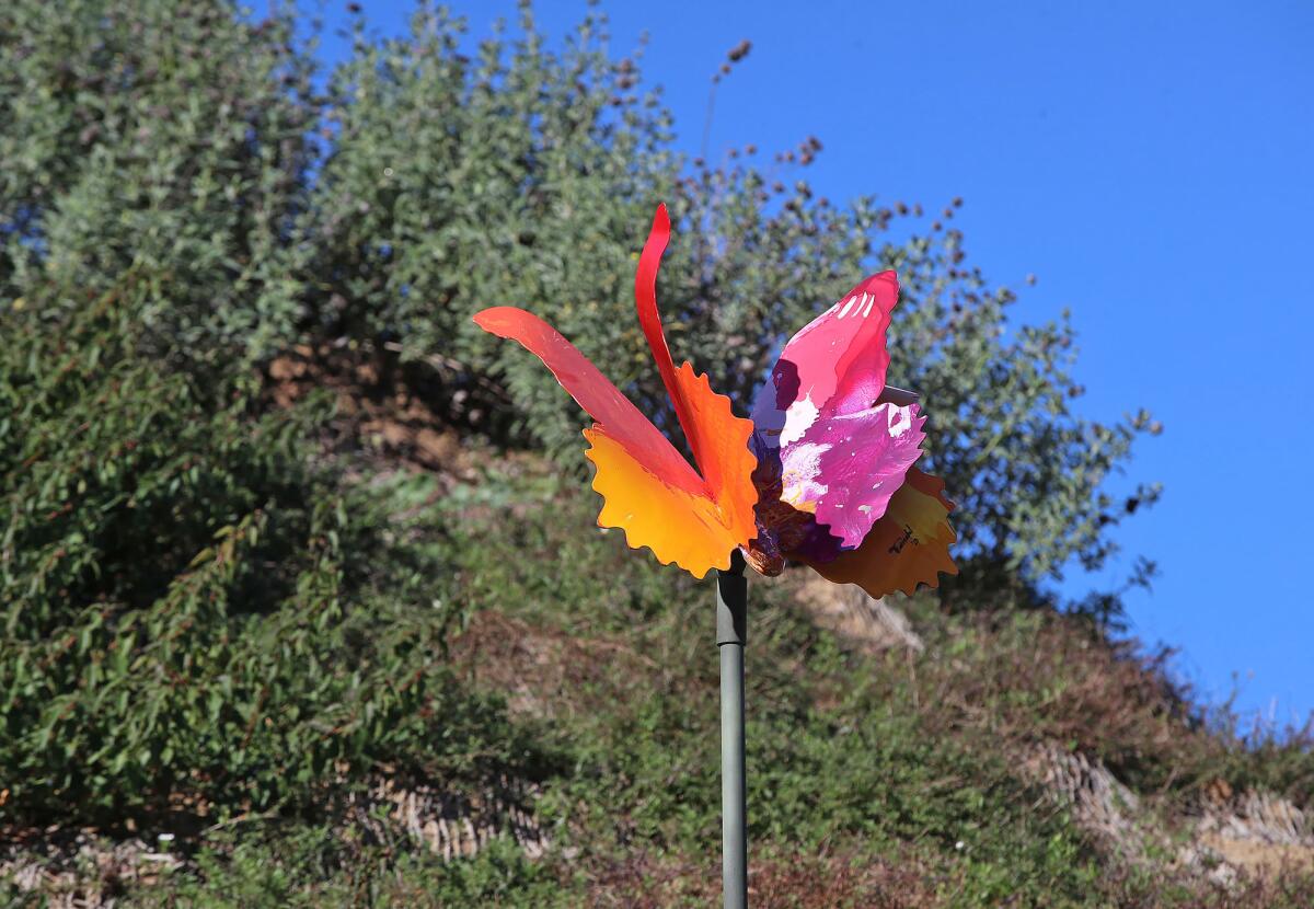 Artist Marisabel Bazan's "La Magic de Colleta" butterfly sculptures at Marina View Park in Costa Mesa.