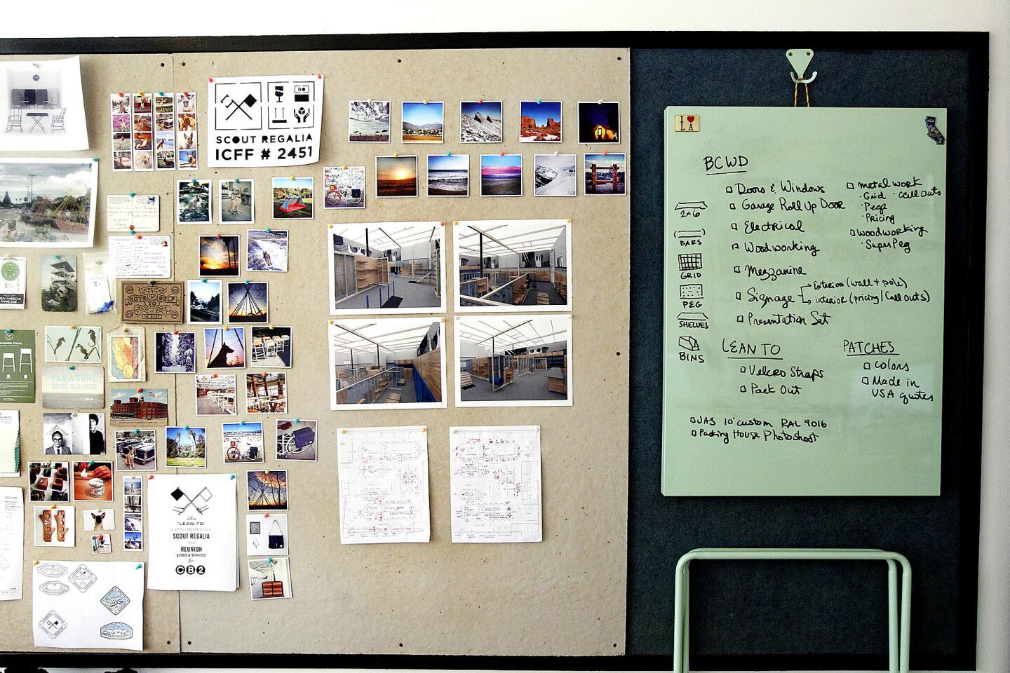An inspiration board, left, hangs next to the SR Foldable Table at Scout Regalia headquarters in Glassell Park. The table top can be detached, hung on the wall and used as a magnetic dry erase board.