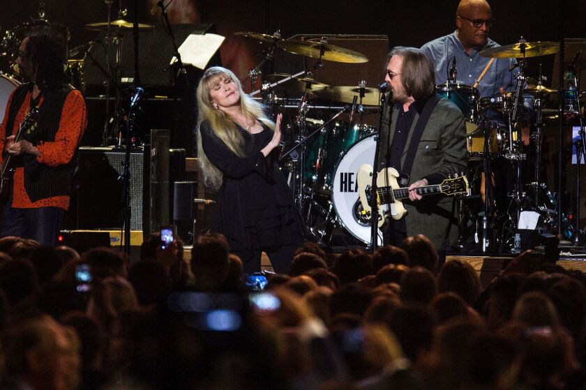 LOS ANGELES, CA - FEBRUARY 10, 2017 : Tom Petty singing a duet with Stevie Nicks performs as the honoree of the Recording Academy's MusiCares Person of the Year at the Los Angeles Convention Center on February 10, 2017 in Los Angeles, California.(Gina Ferazzi / Los Angeles Times)