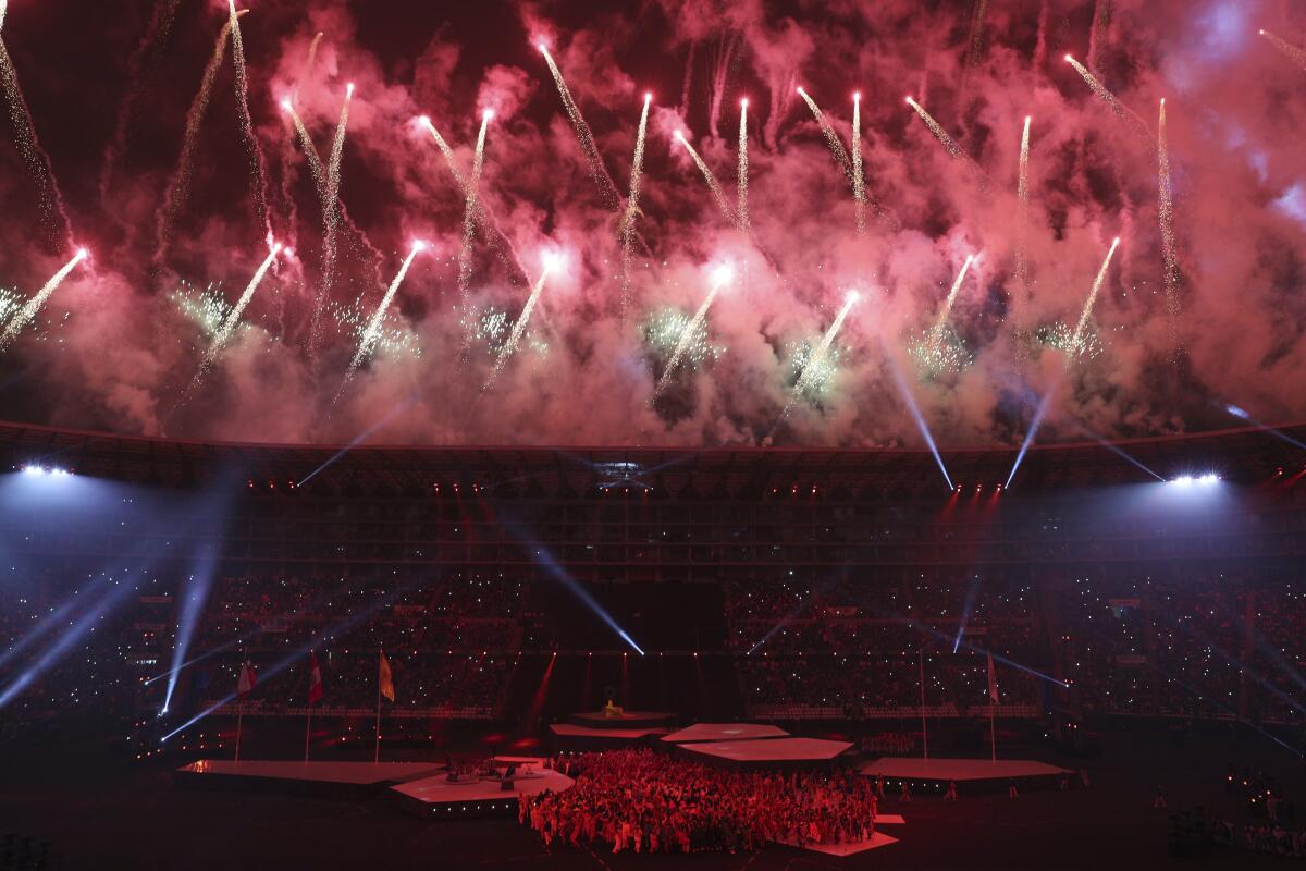 Fireworks explode over the National stadium during the closing ceremony of the Pan American Games in Lima, Peru, Sunday, Aug. 11, 2019. (AP Photo/Martin Mejia)