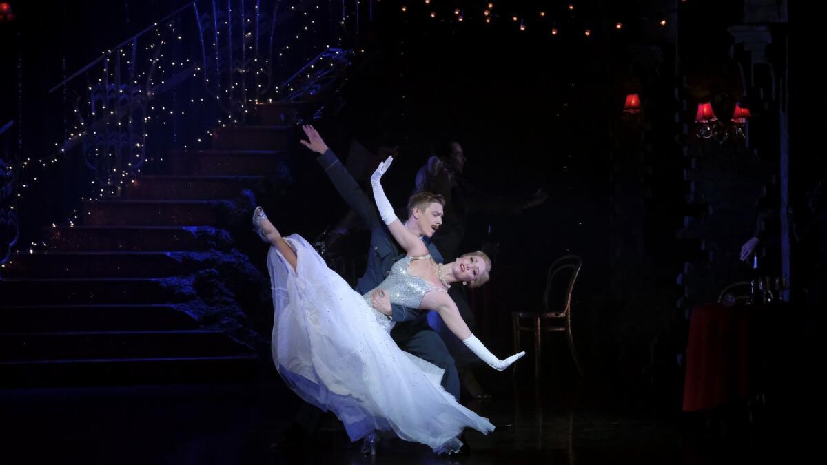 The pilot (Andrew Monaghan) dancing with Cinderella (Ashley Shaw).