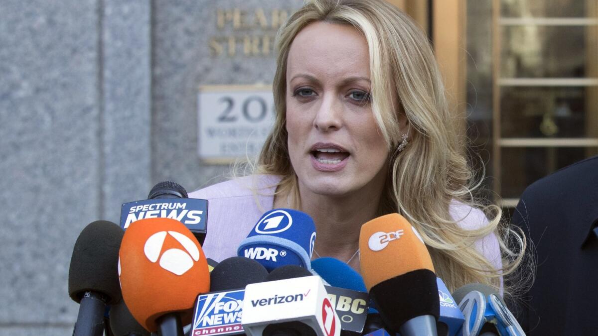 Stormy Daniels spoke outside federal court on April 16 in New York. Parts of her book "Full Disclosure" have been leaked.