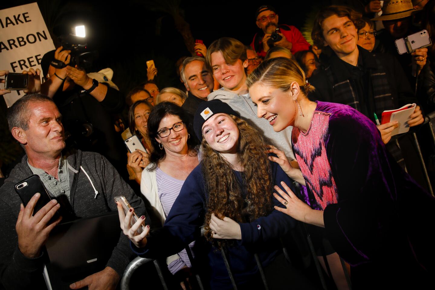 "Little Women" director Greta Gerwig takes a picture with fan Malia Reed outside the Palm Springs International Film Festival Film Awards Gala.