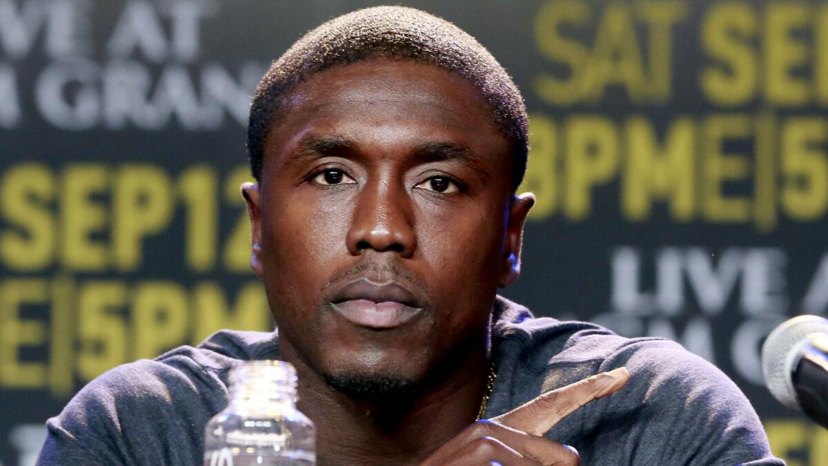 Andre Berto addresses reporters about his upcoming fight against Floyd Mayweather Jr. during a news conference in Los Angeles on Aug. 6.
