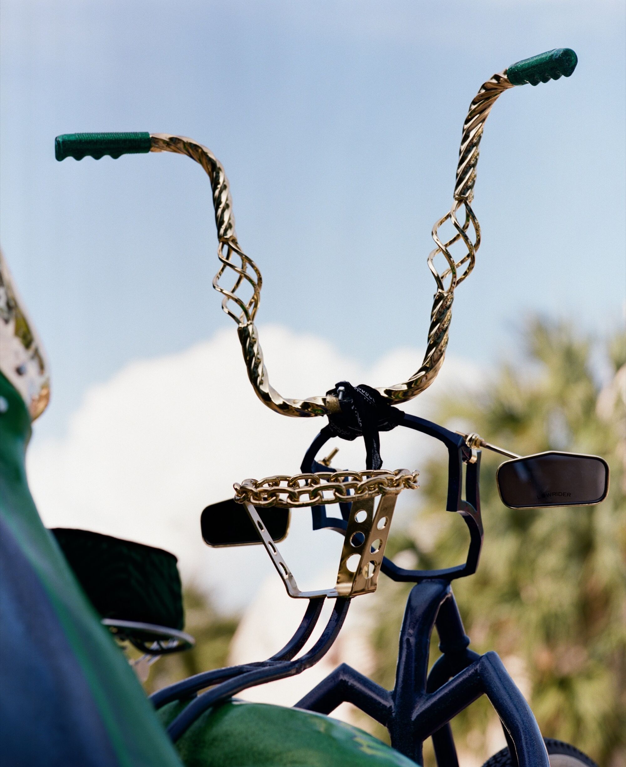 Gold lowrider handlebars.