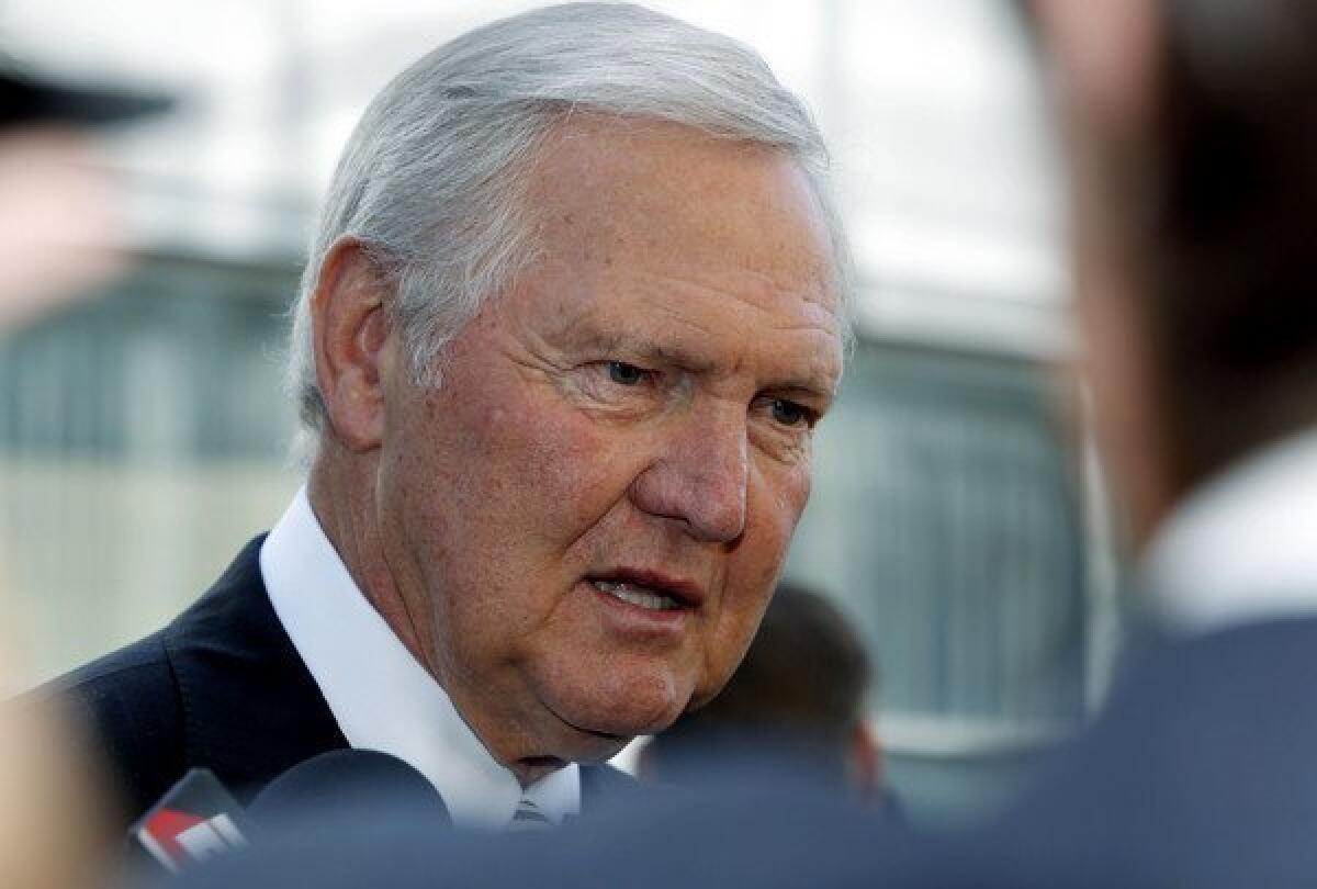 Lakers great Jerry West, arriving for the Jerry Buss memorial service two weeks ago, says the Lakers will make the playoffs this season.