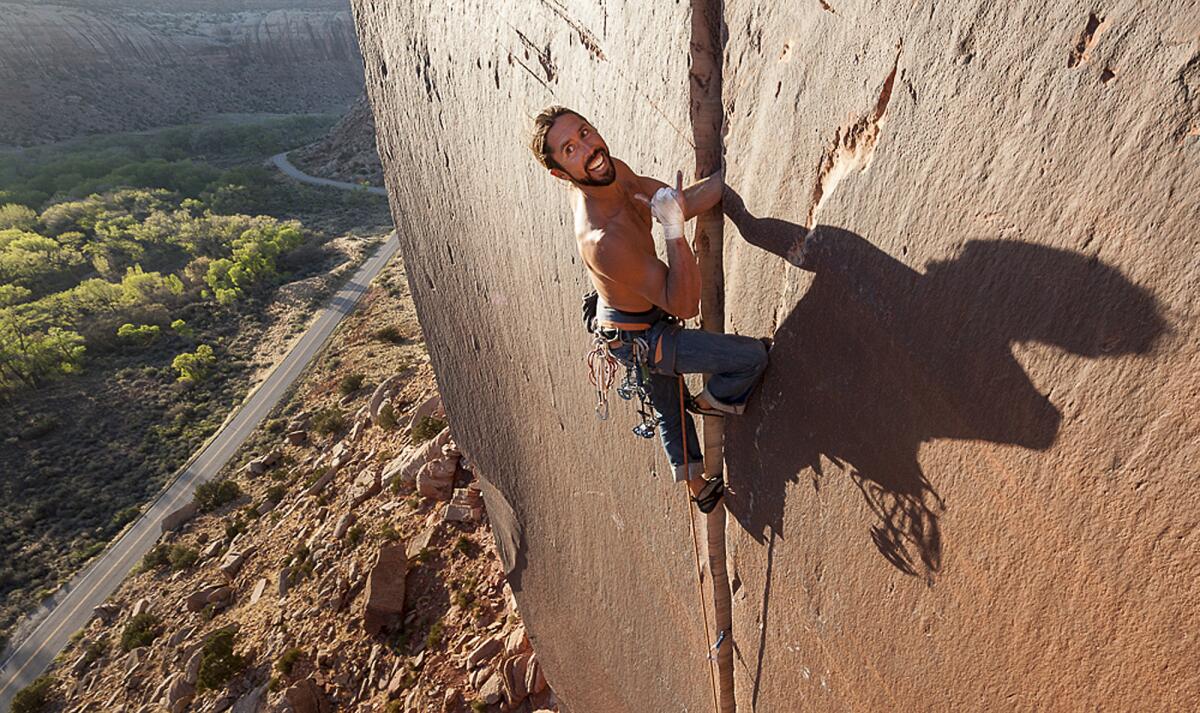 In this May 2013 photo provided by Jerry Dodrill, Brad Parker climbs "Super Crack," a rock climb at Indian Creek, near Moab, Utah. Parker, a veteran Northern California rock climber, died in a fall in Yosemite National Park just hours after proposing to his girlfriend, authorities said.