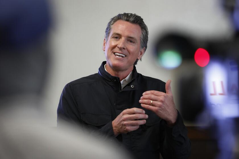 SOUTH GATE, CA - MARCH 10: California Governor Gavin Newsom held a media availability at a vaccination site at South Gate Park, South Gate in Los Angeles County the day after his State of the State Address highlighting California's continued progress in battling the pandemic and commitment to vaccine equity. Governor Newsom toured a vaccination site where local organizations are helping to vaccinate hard-to-reach communities. South Gate Park on Wednesday, March 10, 2021 in South Gate, CA. (Al Seib / Los Angeles Times).