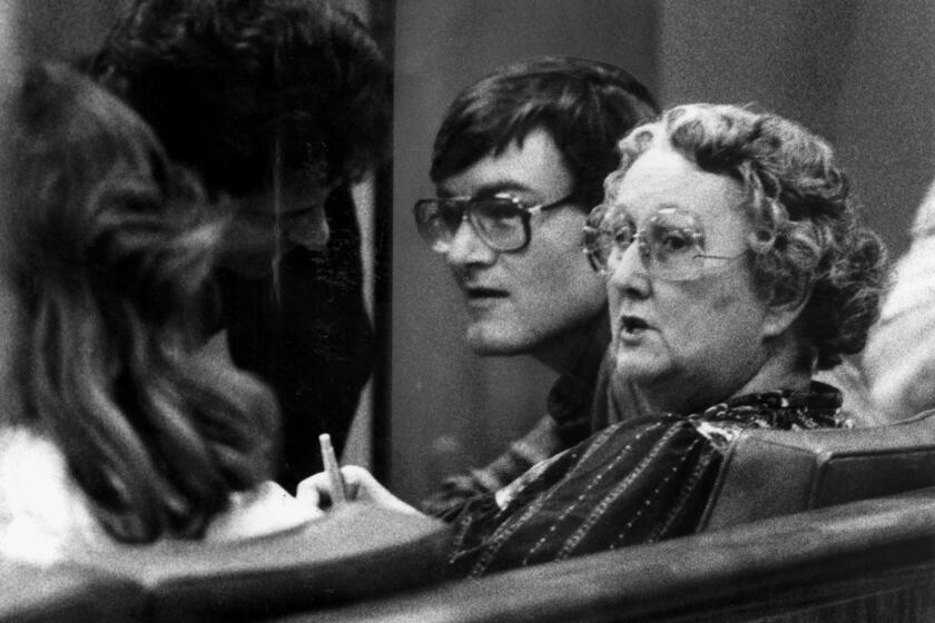 ME.Buckey.1.1216.d11.1––FILE PHOTO AND CAPTION DATED 1–9–85. Reacting to the decision––Peggy McMartin Buckey, right, and her son Raymond Buckey, center, confer with their attorney Danny Davis. PUBLISHED CAPTION DATED 1–17–85: Raymond Buckey and his mother, Peggy McMartin Buckey, who will stand trial in McMartin Pre–School child molestation case. Staff photo by Ken Lubas