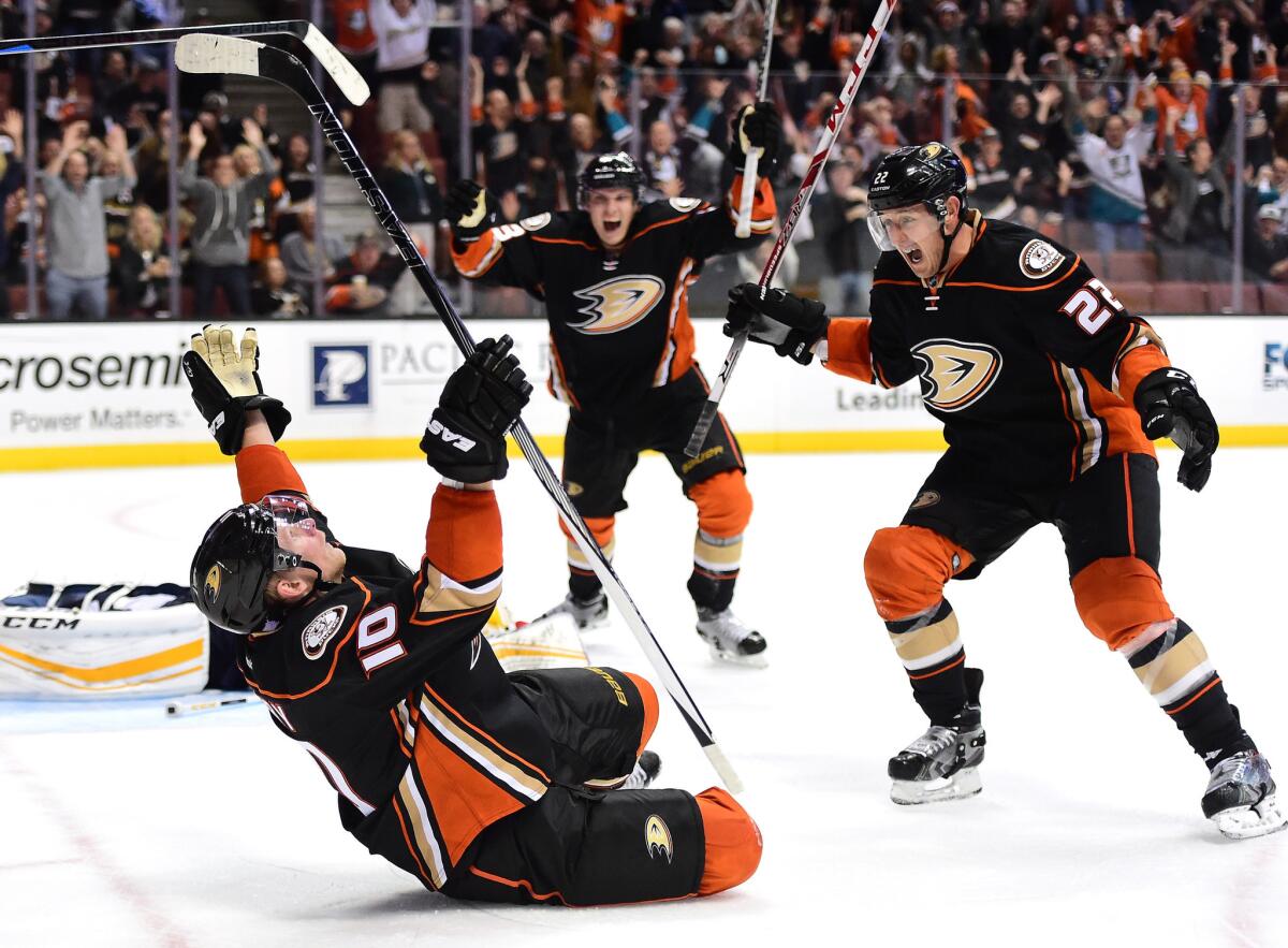 Ducks right wing Corey Perry (10) celebrates his tying goal with teammates Shawn Horcoff (22) and Jakob Silfverberg during a game against the Florida Panthers in Anaheim on Nov. 4.